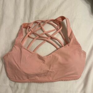 Pink lululemon sports bra (size 2)